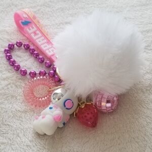 Space-Themed Keychain with White and Pink Accents